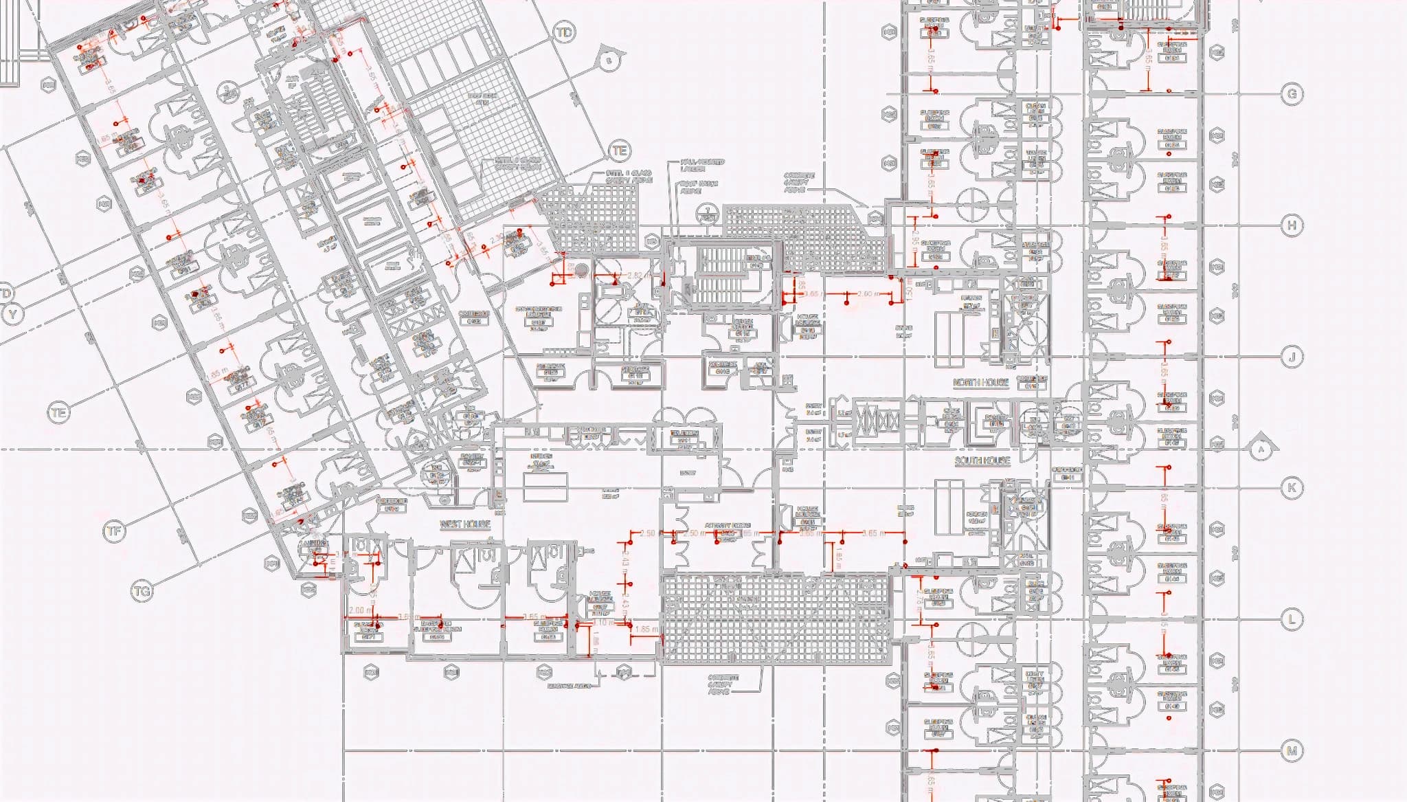 Architectural drawing with the Metro Safety Rail perimeter guardrail — red cable line and stanchion markers — traced around the slab edge of a full floor plate.